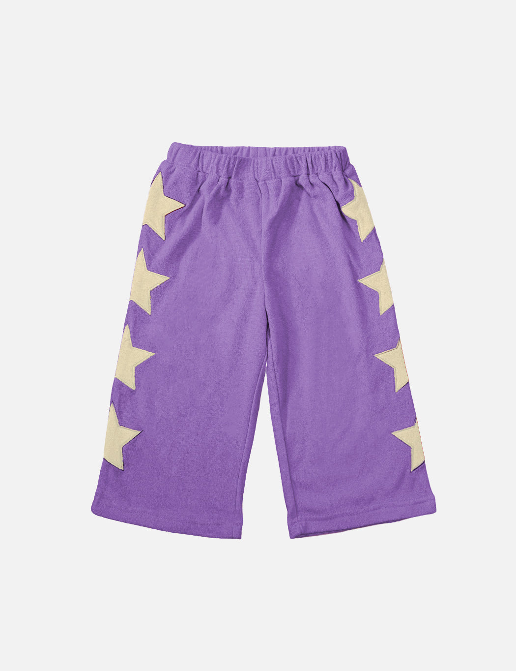 A pair of purple children's pants with a pattern of yellow stars down the side.