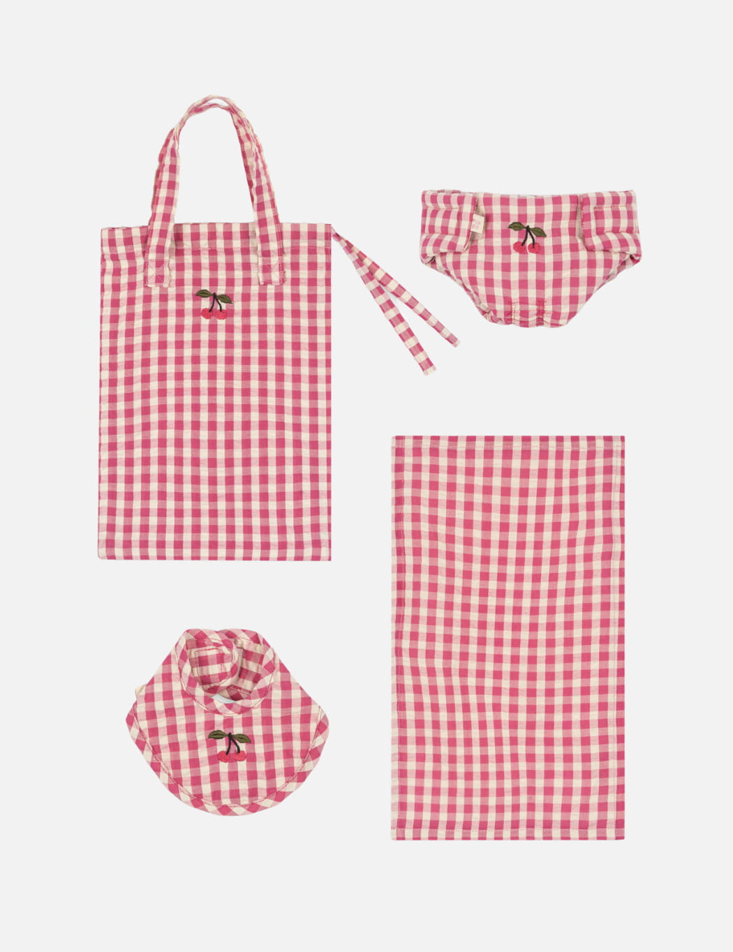 Pink and white checkered tote bag, nappy, and bib for a doll toy