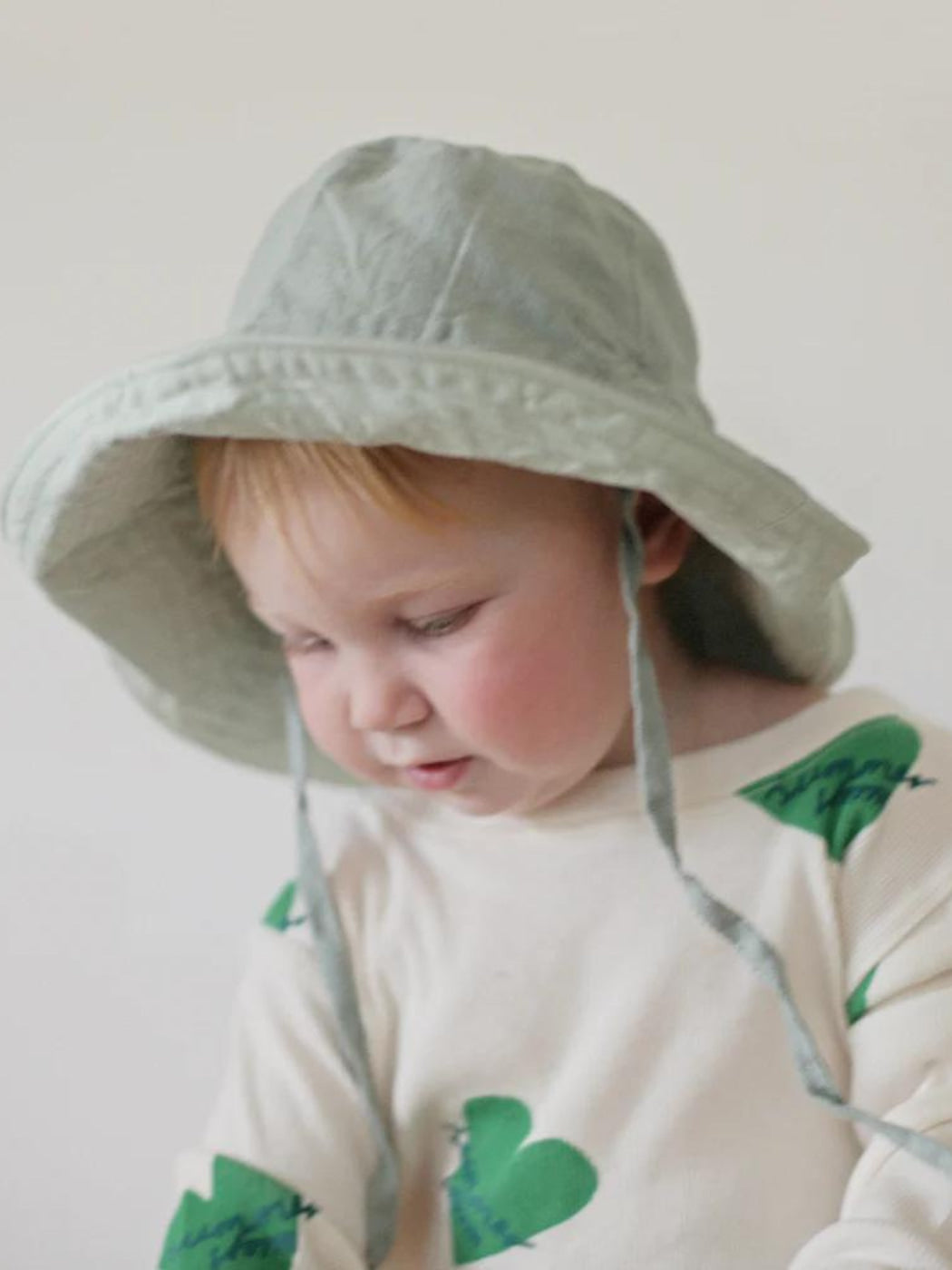 Summer and Storm aqua linen sunhat with a wire rim and ties under the chin